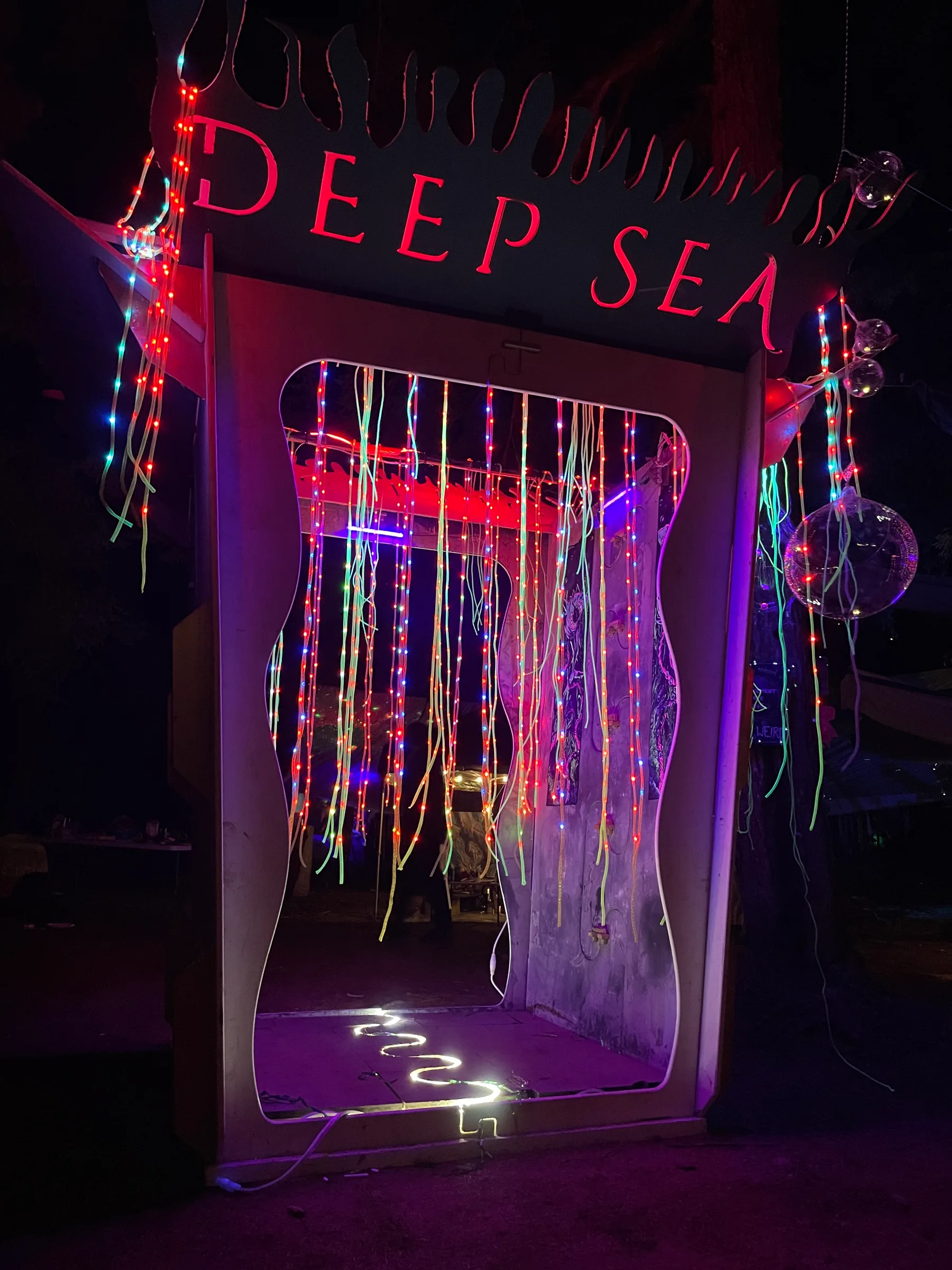 The Noodle Box re-skinned as the Deep Sea party entrance, with a spiked DEEP SEA header lit red