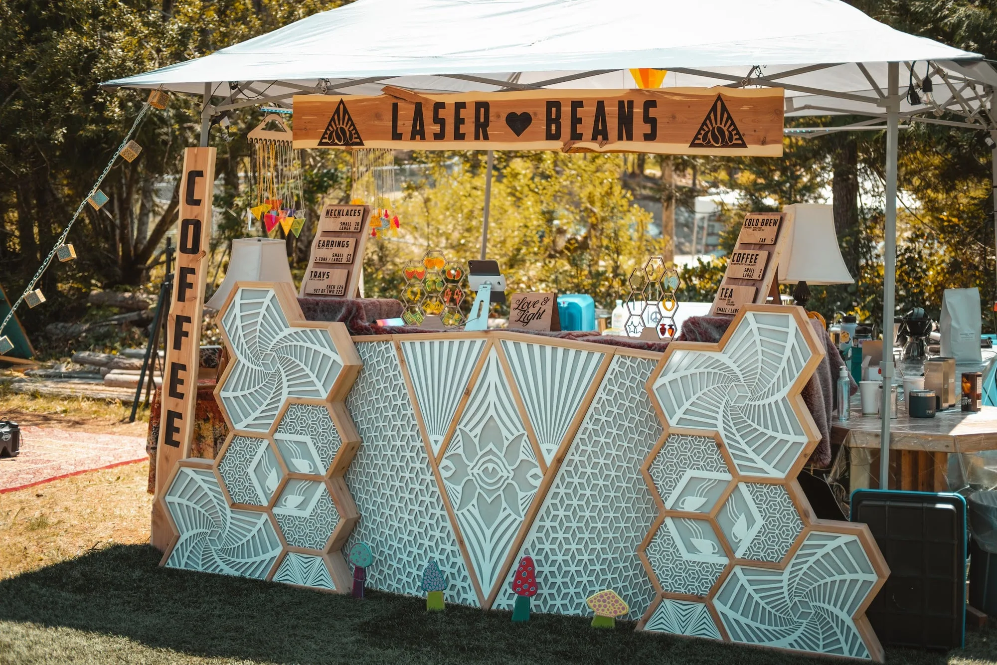 The Observer unlit by day, its cedar-trimmed carved panels serving as the front of a festival coffee bar