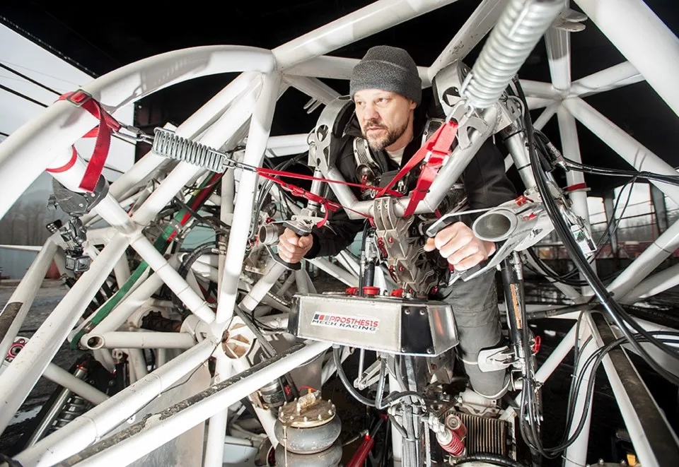 Jonathan Tippett strapped into the pilot's seat inside the Prosthesis frame